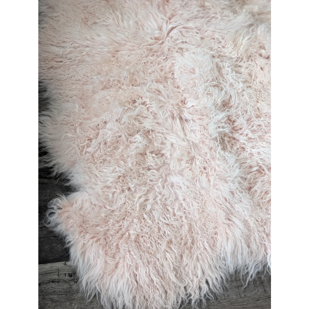 Blush pink Angus Oliver sheepskin rug, 71x47 fluffy Mongolian style