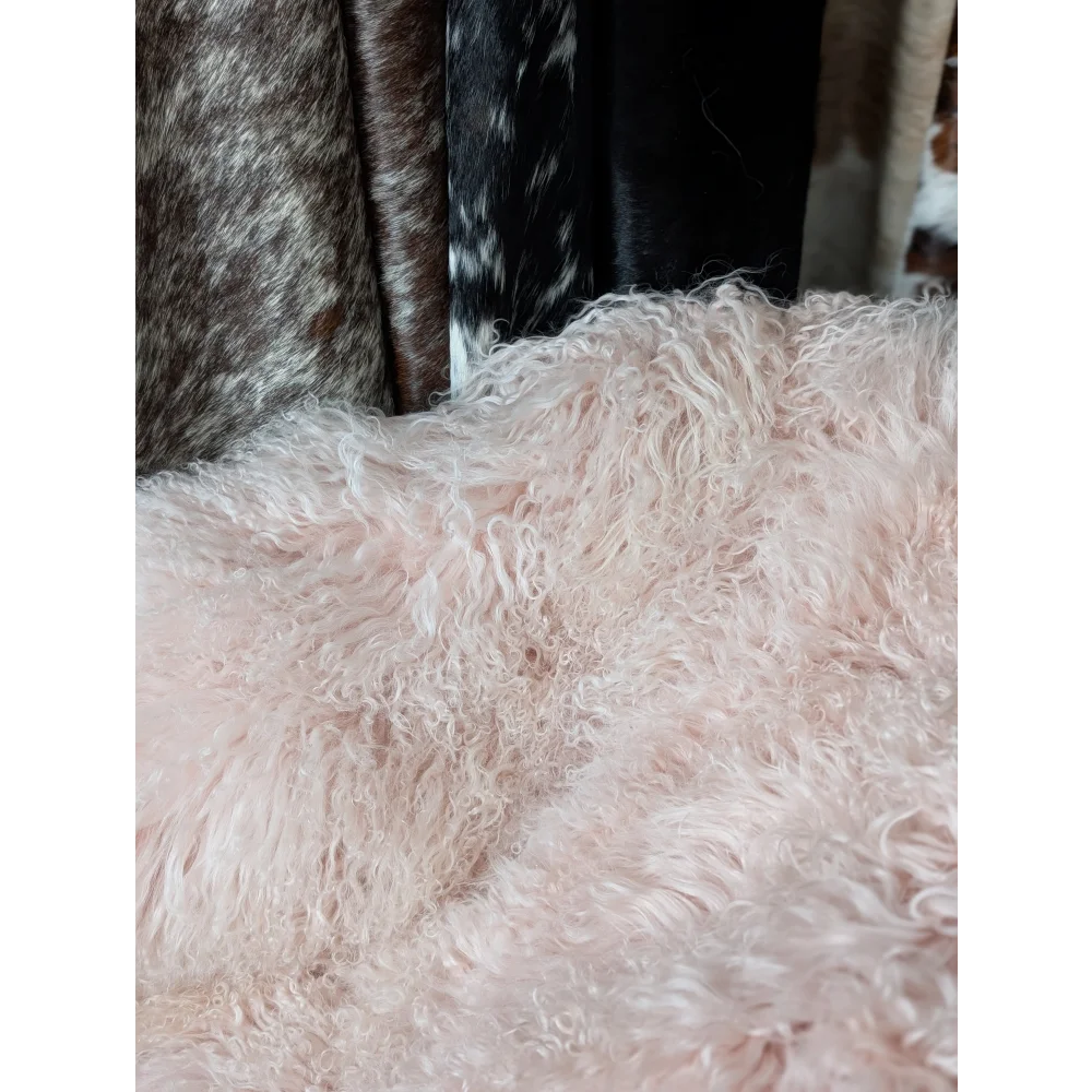 Blush pink sheepskin rug, 71x47 Angus Oliver fluffy mongolian style