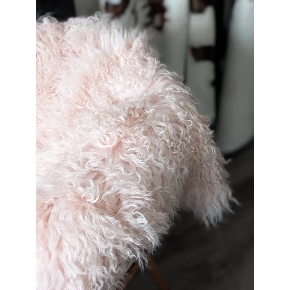 Blush pink Angus Oliver sheepskin rug, soft fluffy 71x47 quad size