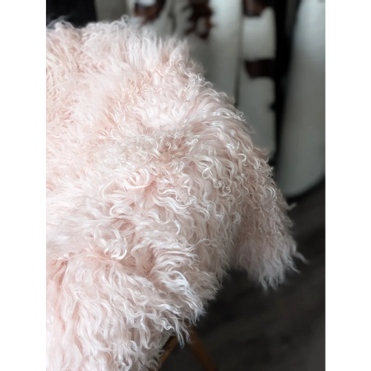 Blush pink Angus Oliver sheepskin rug, soft fluffy 71x47 quad size