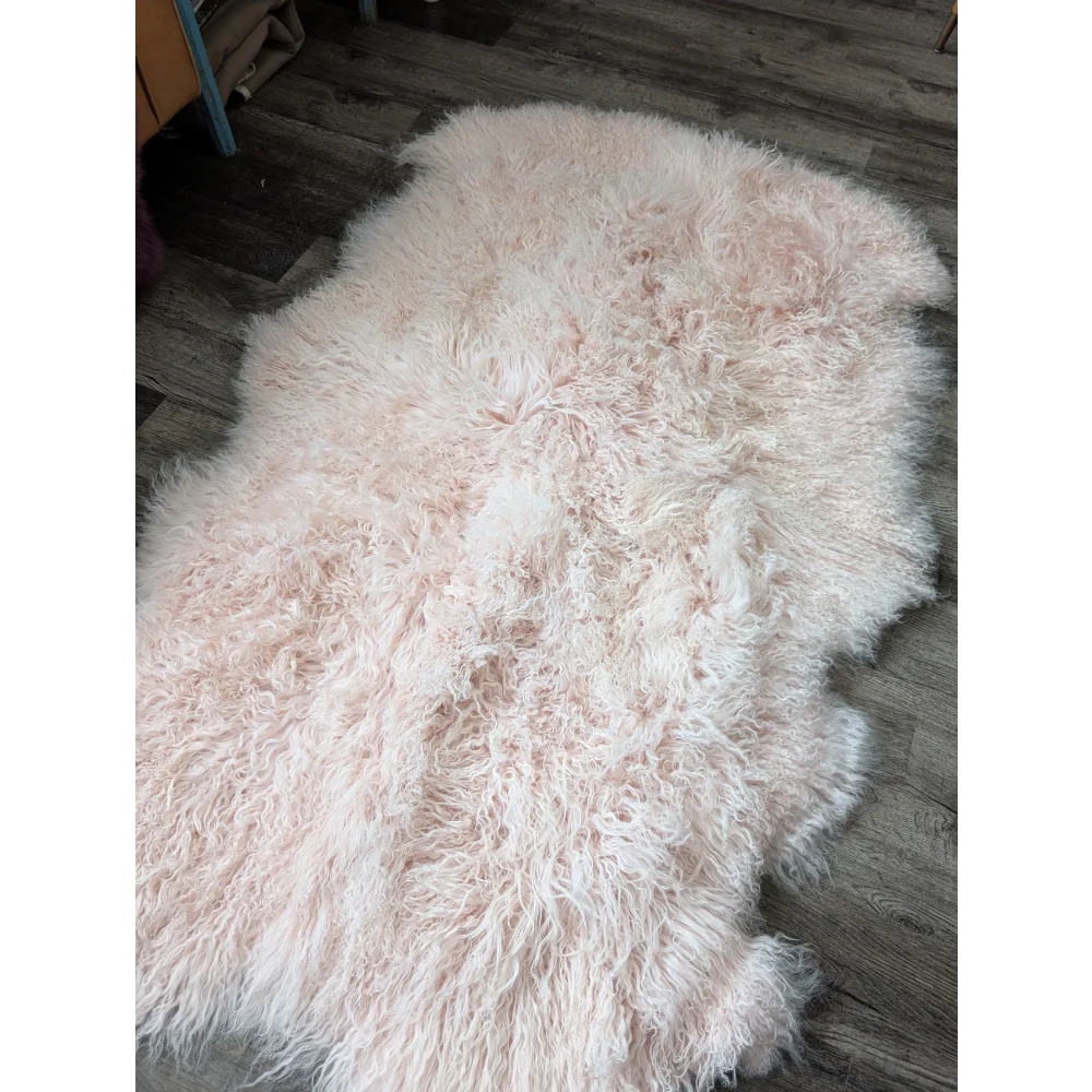 Blush pink Angus Oliver sheepskin rug, plush 71x47 quad size