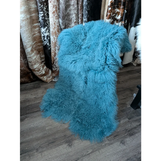 Vibrant turquoise 72x45 aqua quad Mongolian sheepskin rug