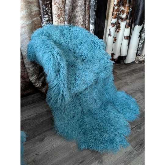 Gorgeous 72x45’’ aqua Mongolian sheepskin rug with soft turquoise fur
