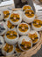 Cute cat face marshmallow ball in basket from 3 Fabulous Cat Dryer Balls