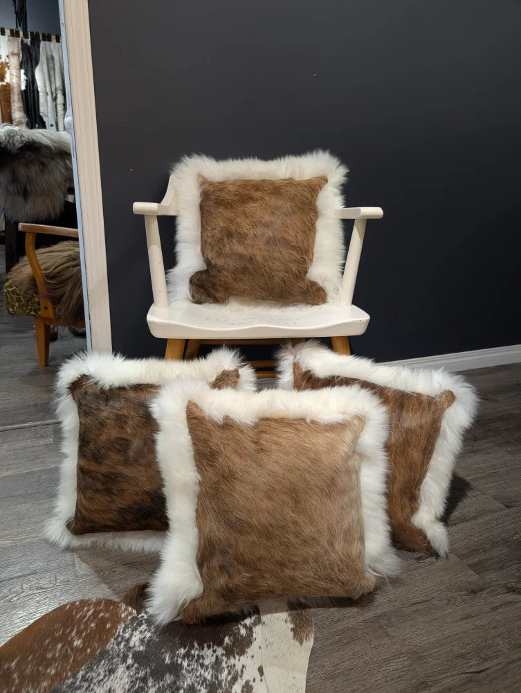 Brown cowhide merino sheepskin cushion with white fur trim perfect for cozy home decor accents