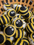 Cute yellow black striped wool bumble bee dryer balls with googly eyes