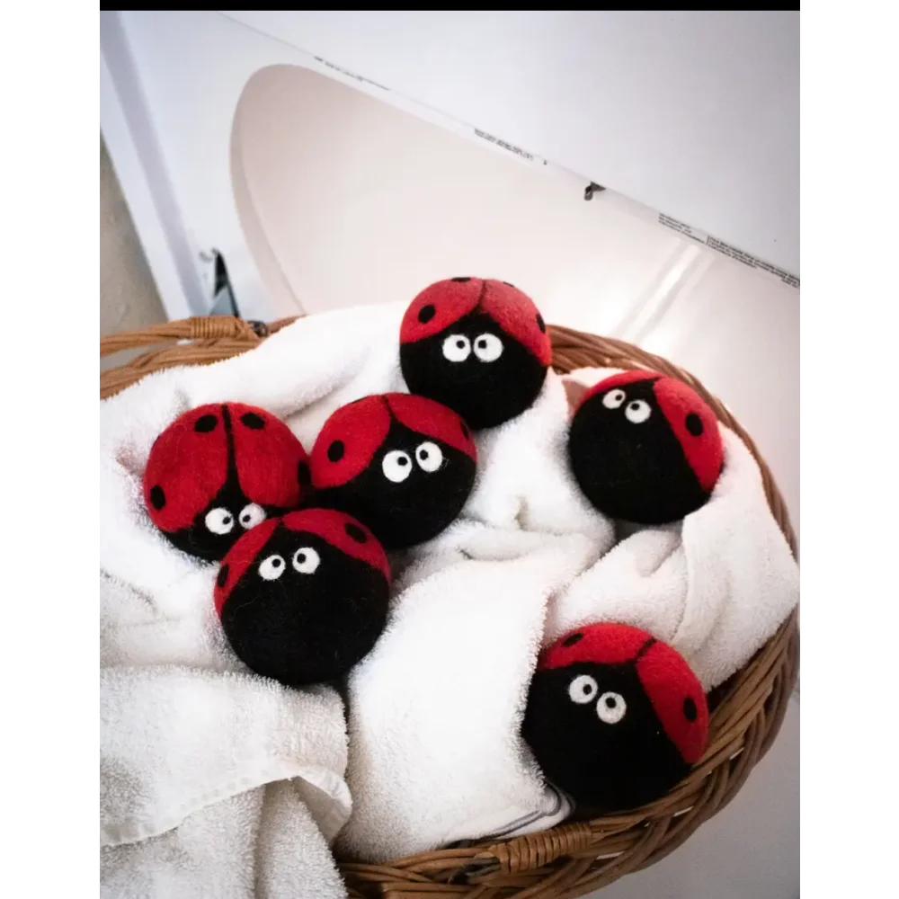 Cute red black ladybug plushie dryer balls with googly eyes