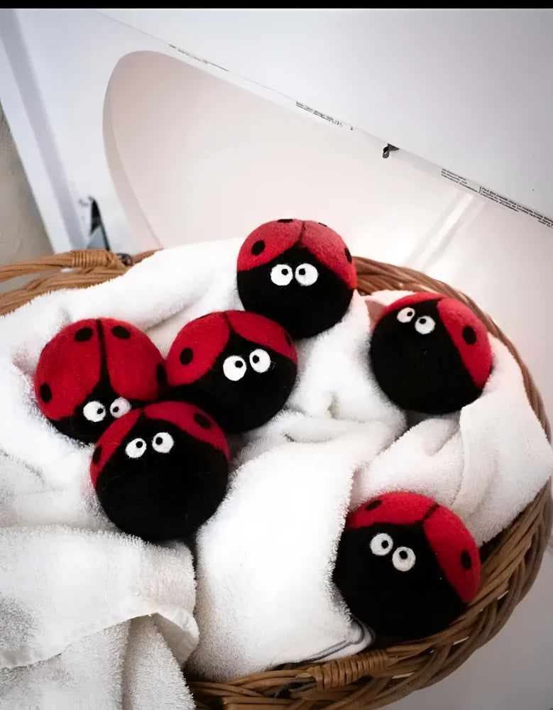 Cute red black ladybug plushie dryer balls with googly eyes