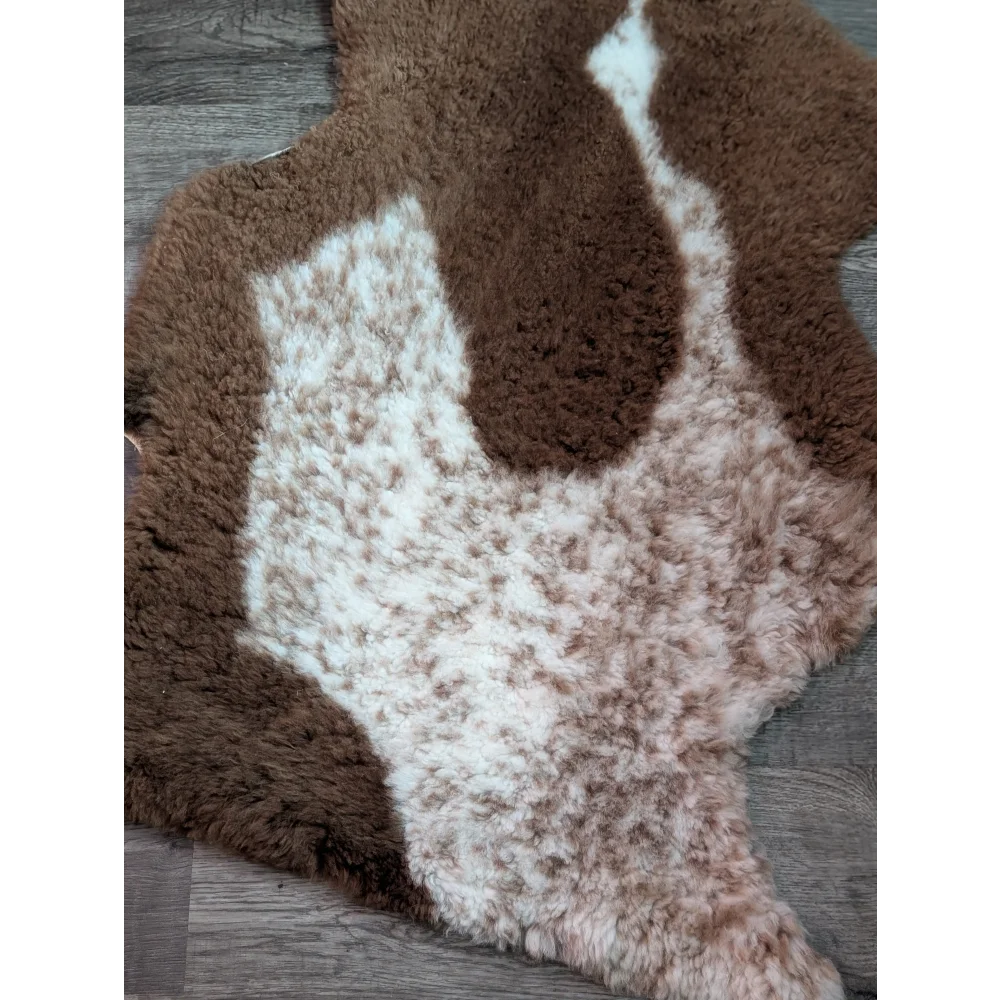 Brown and white tibet highland spotted grade a sheepskin rug with natural fluffy texture