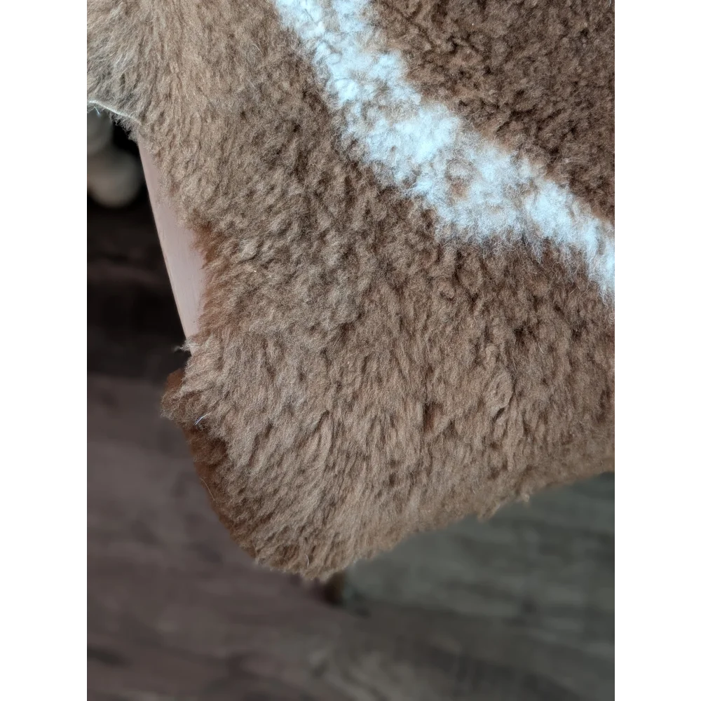 Brown and white fluffy grade a- sheepskins with soft textured surface tibet highland spotted shearling fabric