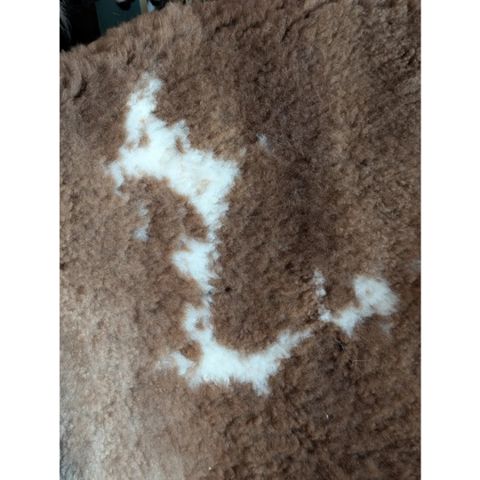 Brown fluffy tibet highland spotted sheepskin rug with white patchwork design grade a- sheepskins