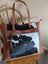 Brown leather oakley bag with real cowhide black and white patchwork frayed edges and embossed strap spacious bag