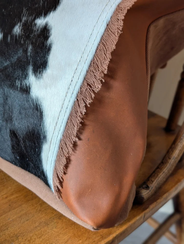 Brown leather-trimmed oakley bag cushion with real cowhide black and white pattern spacious and stylish