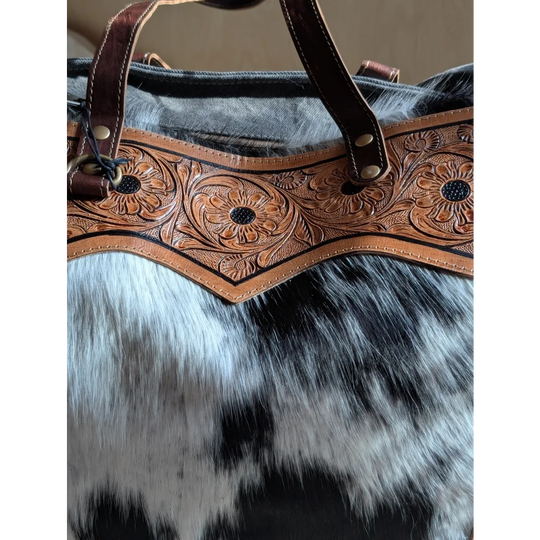 Brown leather cartwright hand-tooled bag strap with intricate floral tooling and brass hardware for the sunflower weekender bag