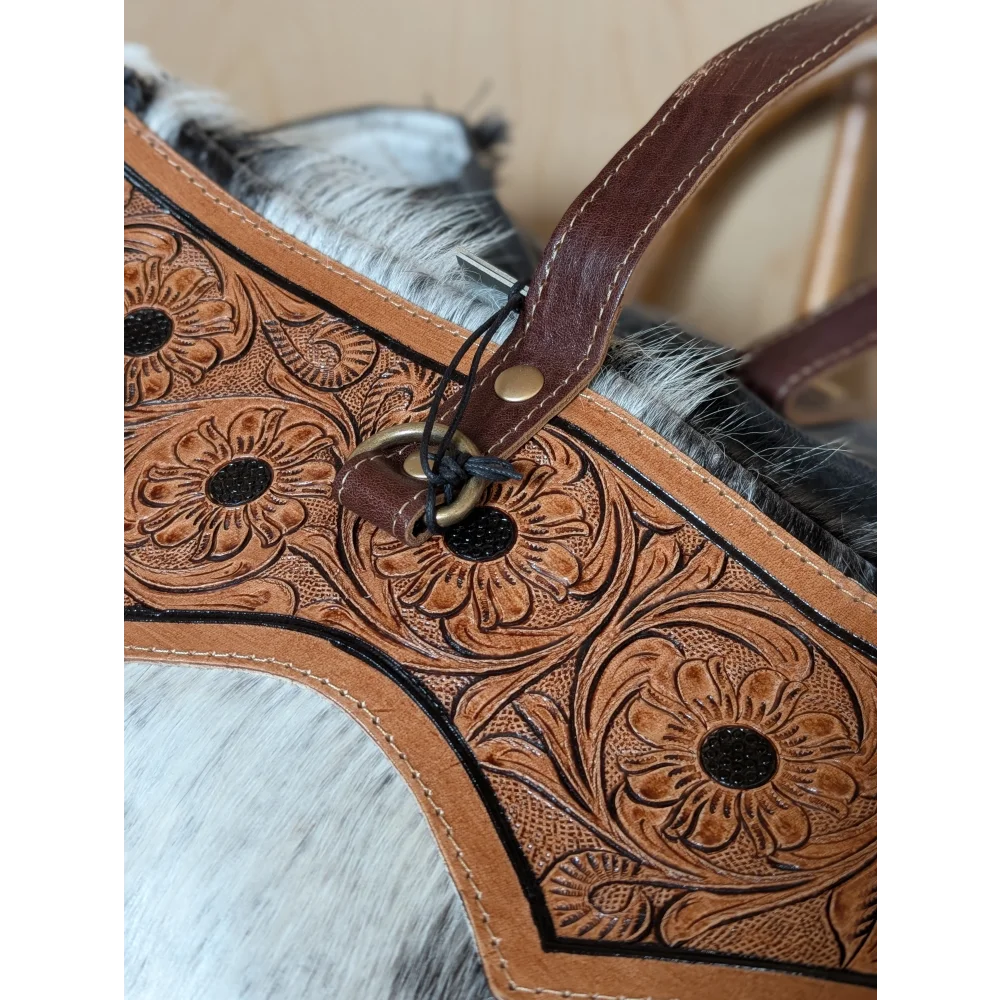 Brown leather horse halter with floral tooled patterns and black stitched outlines by cartwright hand-tooled bag