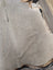Large gray cowhide rug with natural edges and subtle brown speckles in a lovely cowhide 77.5 by 66 inches