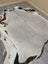 Large cowhide rug with a soft gray center and black and white speckled border lovely cowhide 77.5 x 66 inches