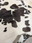 Large lovely cowhide rug with soft fur texture in black and white spotted pattern measuring 77 x 64 inches