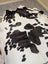 Large lovely cowhide rug 77 x 64 with black and white pattern and natural irregular edges perfect for home decor
