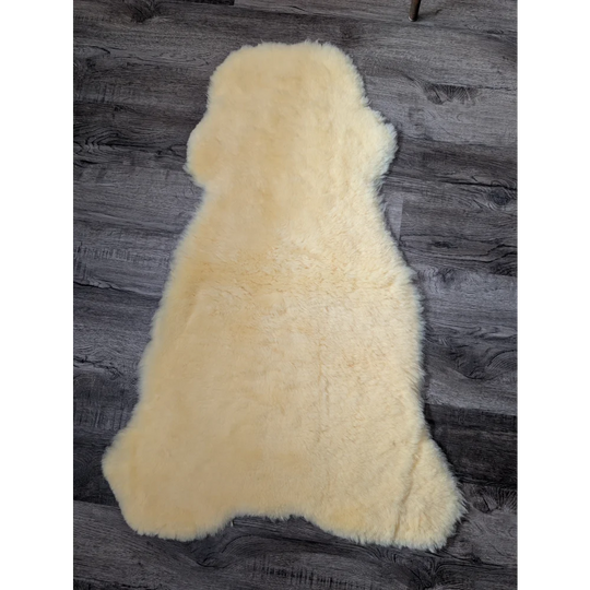 Soft cream-colored medical sheepskin rug, 44.5x24in shearling wool for blood flow