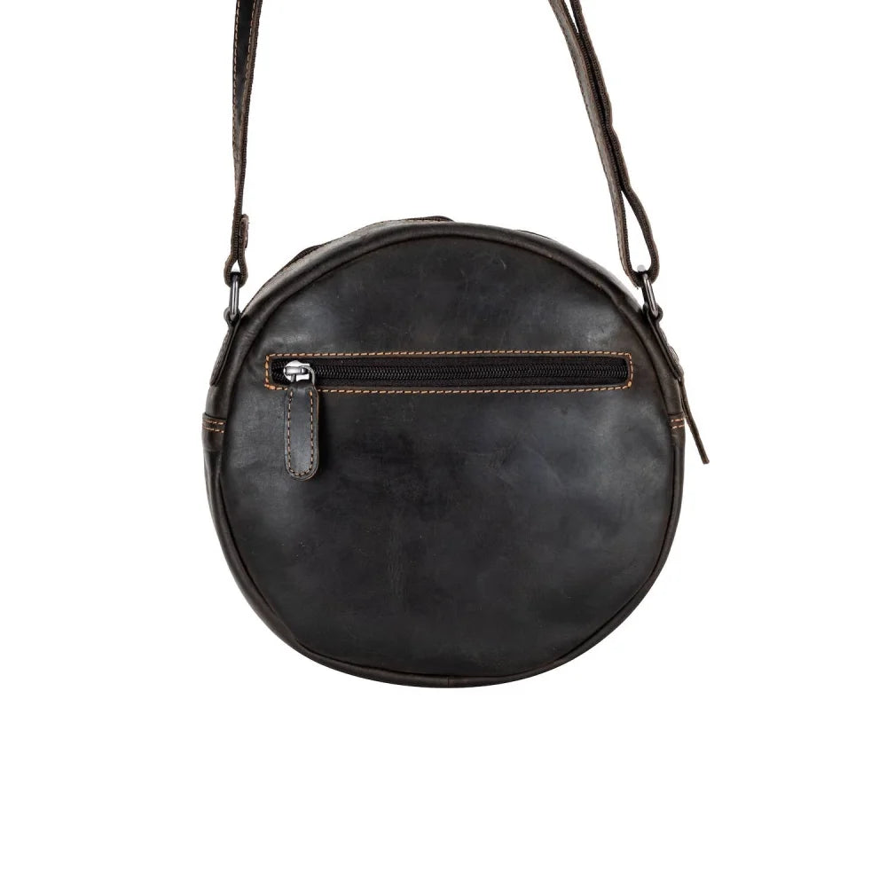Sandy leather shoulder bag with black circular design, zipper compartment