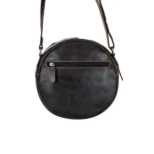 Sandy leather shoulder bag with black circular design, zipper compartment