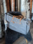 Matty affair canvas hair on weekender bag with gray canvas and tan leather handles