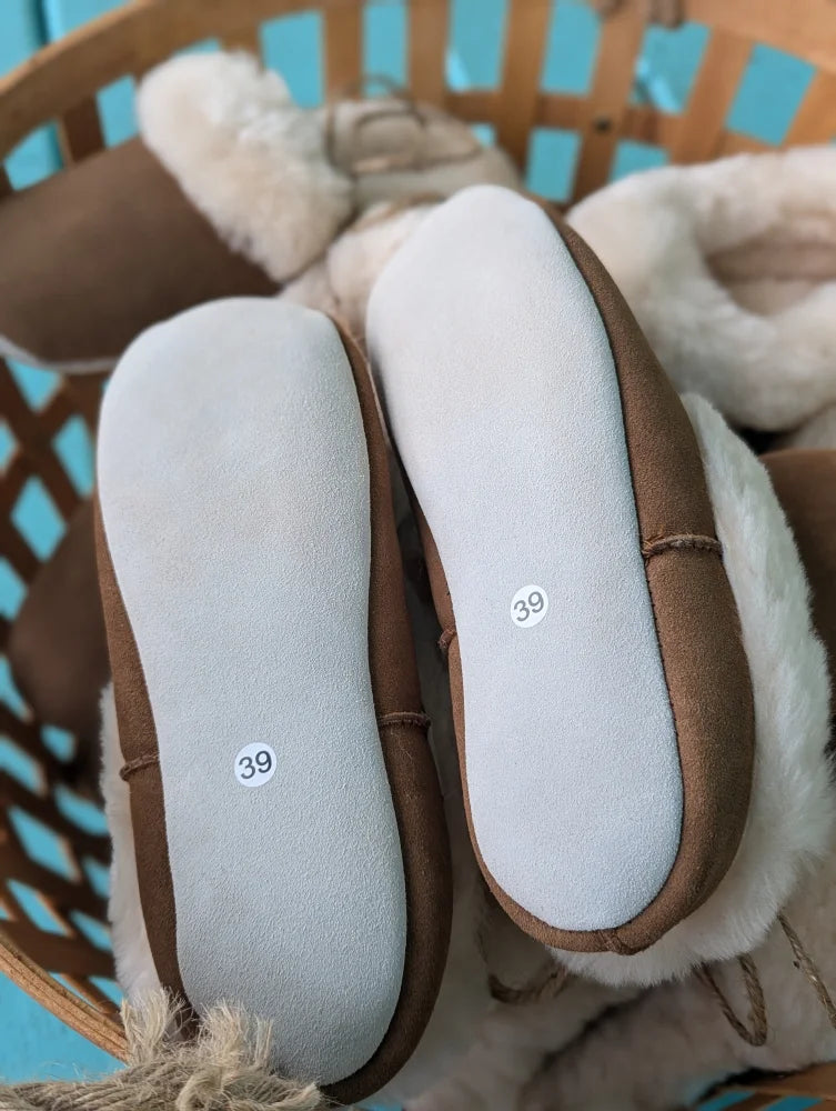 Cozy brown and white sheepskin slippers feel like soft fluffy clouds, size 10US