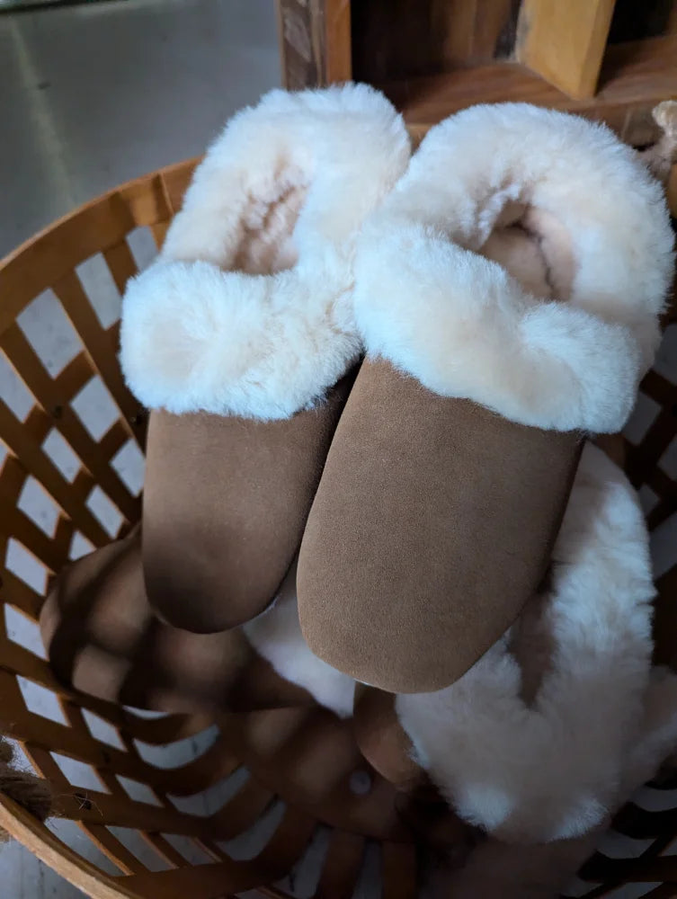 Cozy beige and white sheepskin slippers feel like soft fluffy clouds, size 10US
