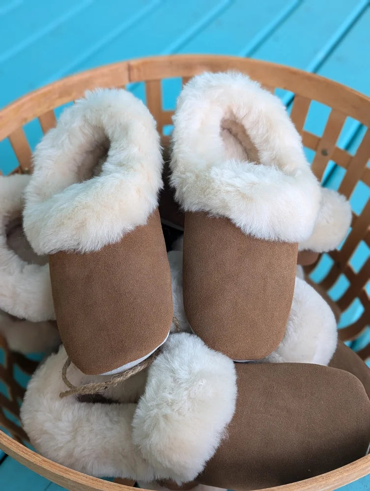 Cozy Sheepskin Slippers with tan suede, shearling lining and white fur trim in size 10US