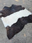 Large cowhide 77 x 76 belted galloway rug with striking black and white pattern and soft fluffy fur texture