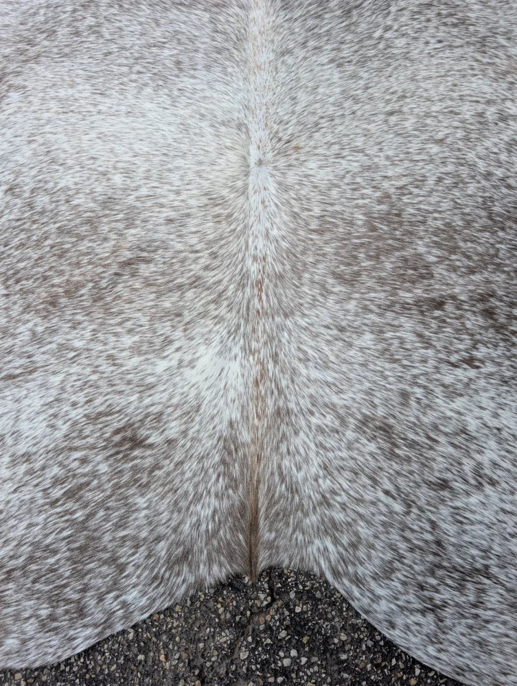 Large 89 by 77 inch grey mix 7 cowhide rug with speckled gray and white texture and unique rustic charm