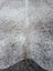 Large 89 by 77 inch grey mix 7 cowhide rug with speckled gray and white texture and unique rustic charm