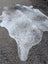 Large cowhide rug 89 x 77 with unique gray and white mottled pattern adds rustic charm to any space
