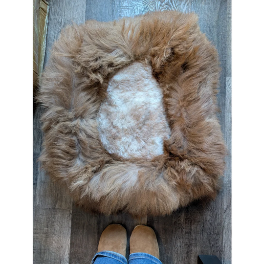 Brown fluffy highland sheepskin pet bed with white center rug