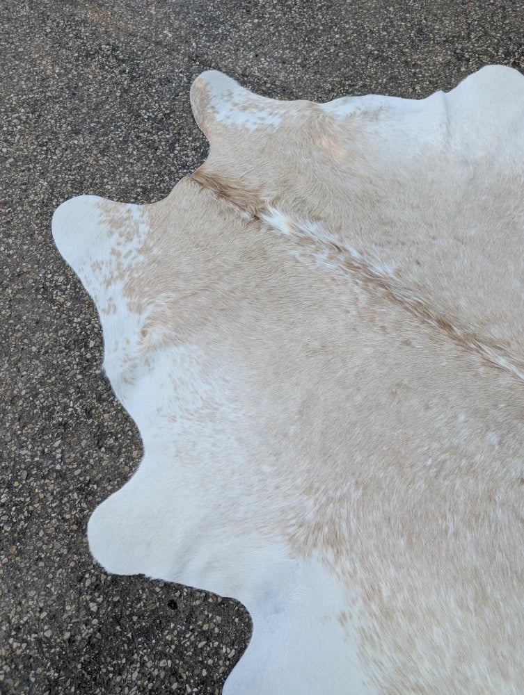 92 x 81 large cowhide rug in off-white and beige with soft texture and unique characteristics for rustic charm