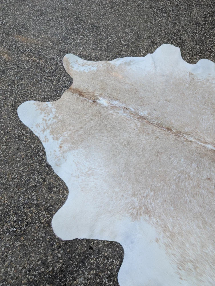 Large cowhide rug 92 x 81 in off white and beige with unique characteristics and rustic charm soft textured surface