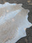 98 x 89 large cowhide rug in natural white and beige with soft fluffy texture and unique rustic charm