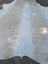 Large cowhide rug 98 x 89 with soft white and beige fur showcasing unique characteristics and rustic charm