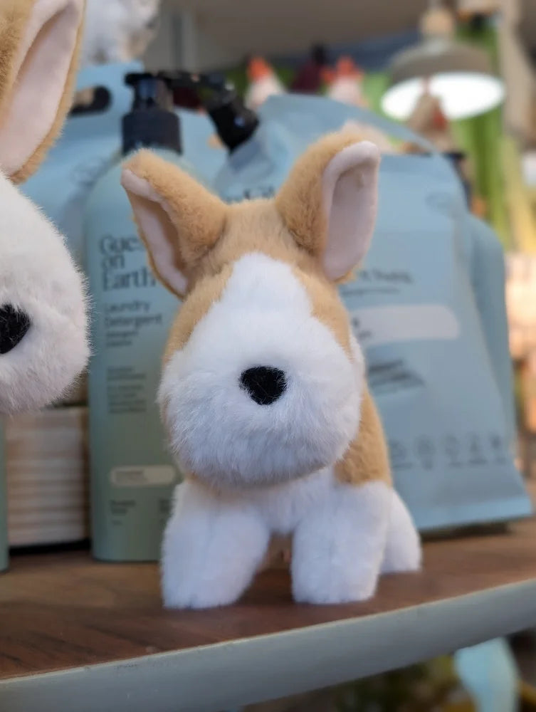 Adorable carl the corgi large size soft plush dog toy with tan and white fur and a black nose