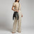 Black white speckled genuine leather Chaps crossbody bag with fringe, Canada