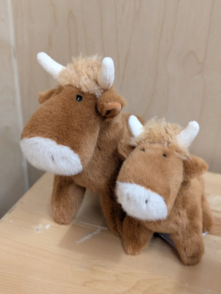 Brown plush highland cow stuffed animals with white horns and snouts adorable highland cow plush toys
