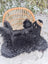 Adorable merino sheepskin black bear rug handmade with black fluffy fur and tan accents on ears and paws