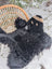 Adorable hand made merino sheepskin black bear rug with fluffy plush exterior and tan facial markings