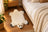Adorable merino sheepskin polar bear rug with plush faux fur and black tipped paws and nose in white color