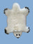 Adorable merino sheepskin polar bear rug with white faux fur and black tipped paws and nose perfect for cozy decor