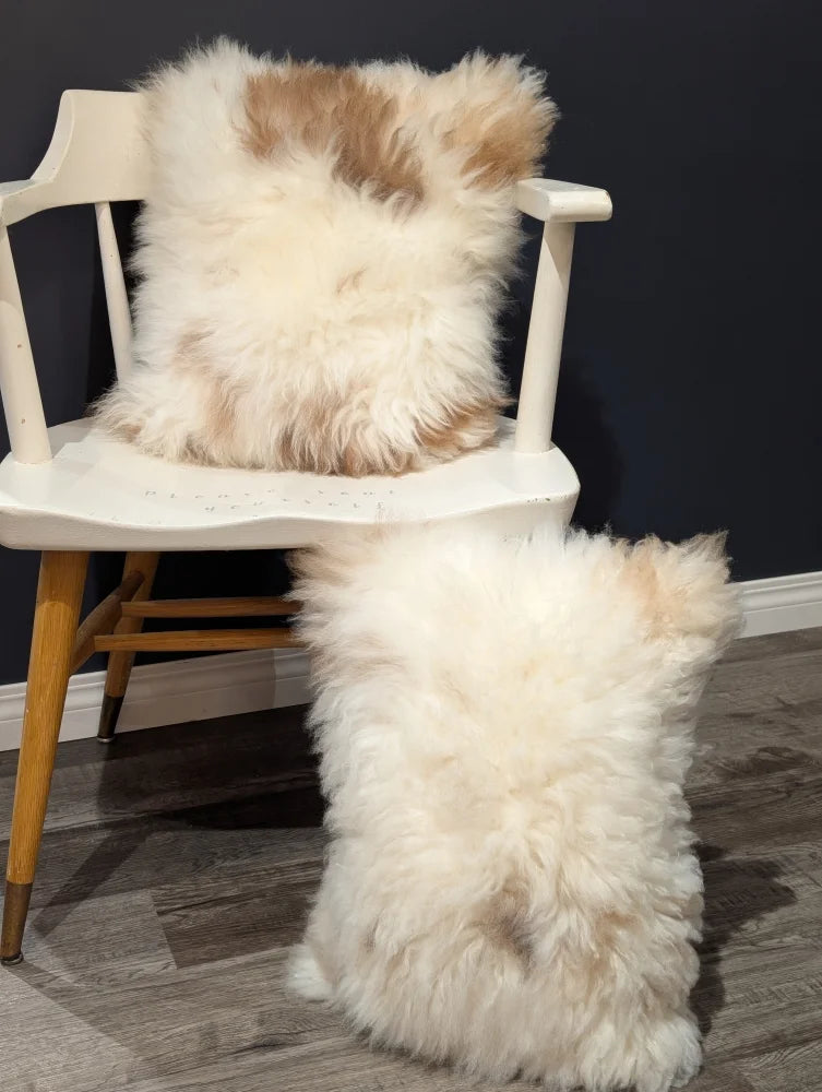 Adorable set of angus oliver cream and tan sheepskin throw pillows with shaggy texture from canada sheepskin rugs and cowhide rugs