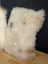 Fluffy off-white sheepskin pillow with soft voluminous fur from adorable set by angus oliver canada sheepskin rugs