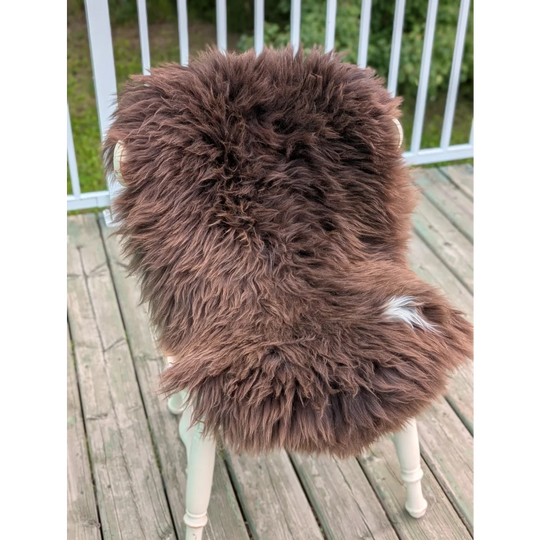 Rare British sheepskin rug 43x26 with white legs and wooden frame