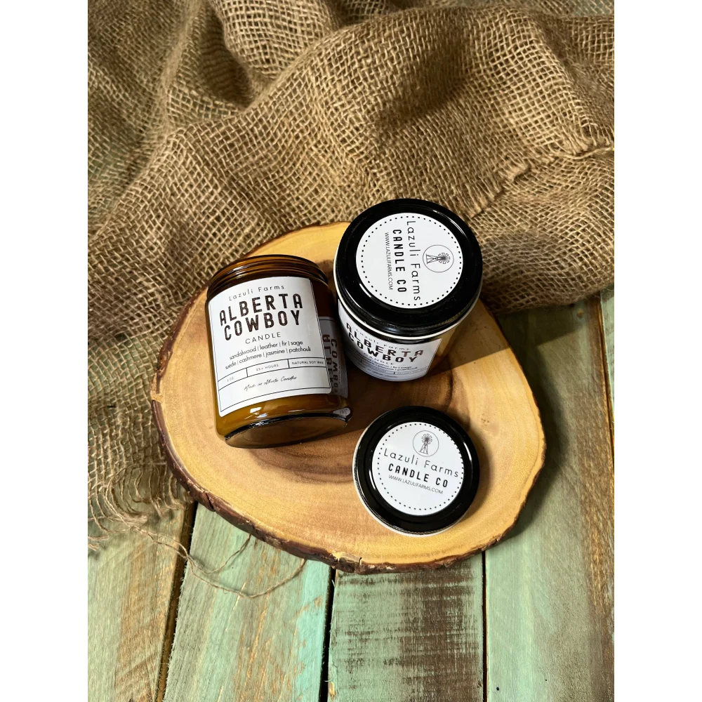 Alberta Cowboy Candle in amber jar with black lid
